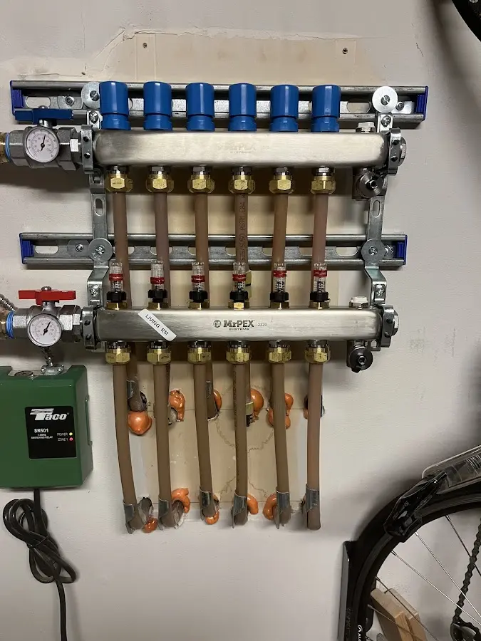 Plumber performing Gas Leak Detection at a residential property in Martinsville